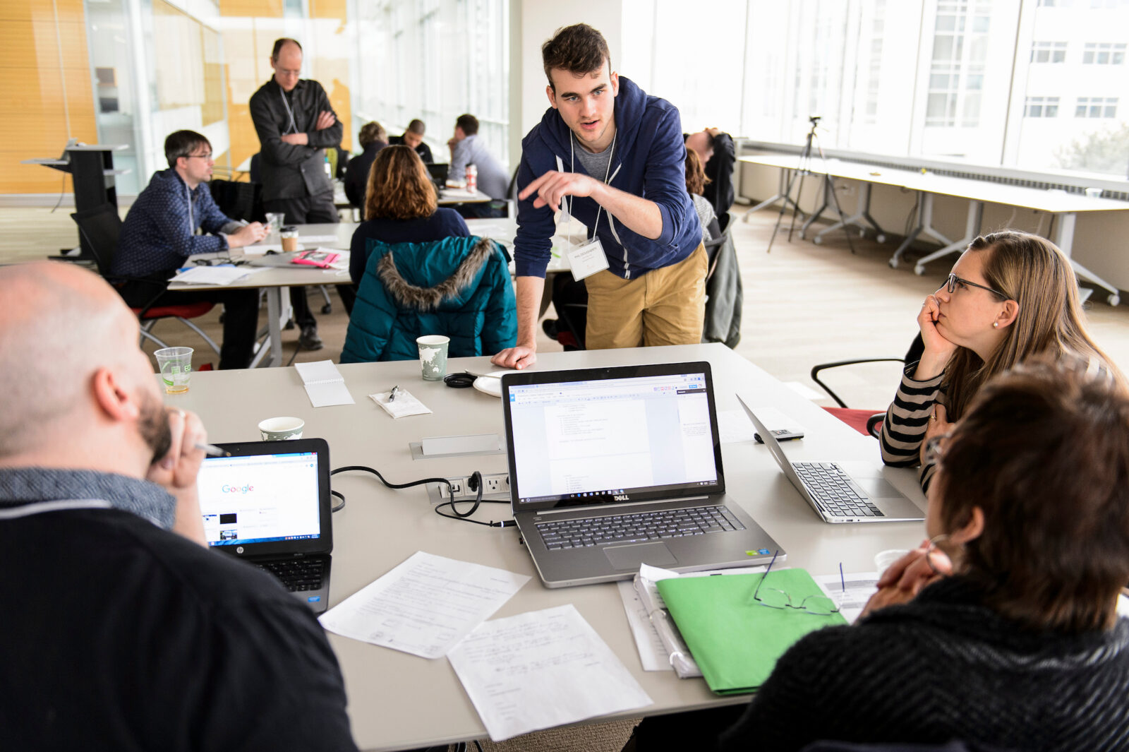 A group works collaboratively at a table during the workshop.